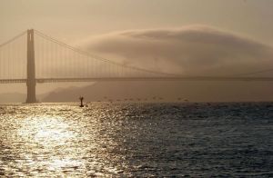 golden gate bridge seagulls bay ocean clouds